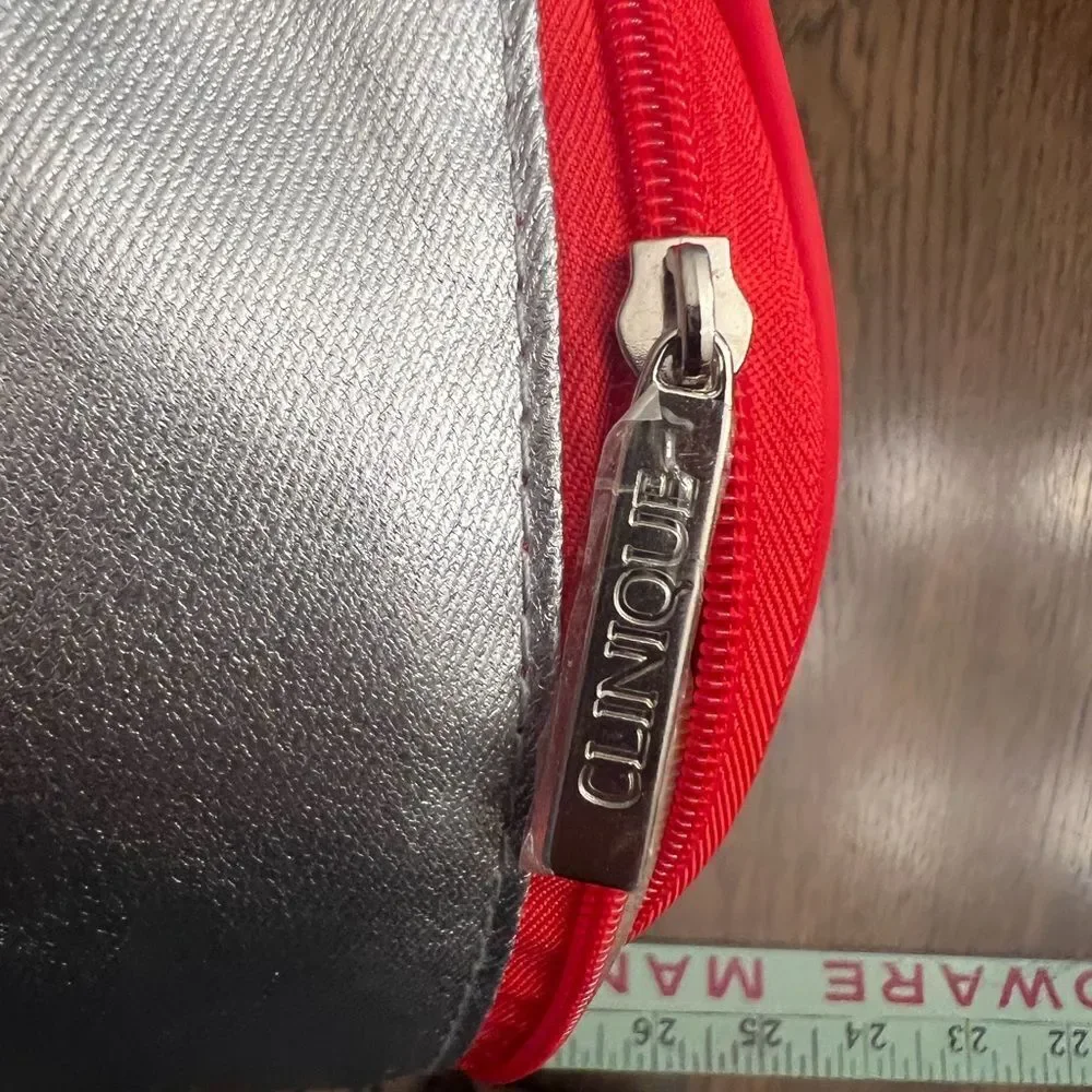 Clinique Silver and Red Cosmetic Bag. Brand new.